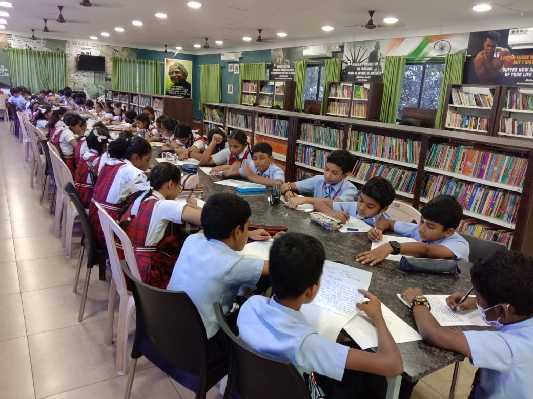 Students studying in the school library at Pragati Academy