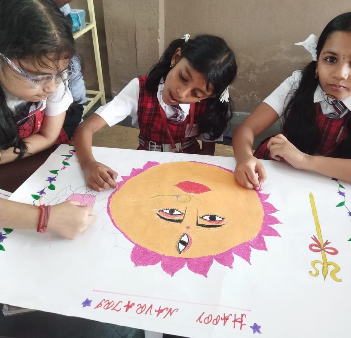 Students collaborating on a creative art project at Pragati Academy